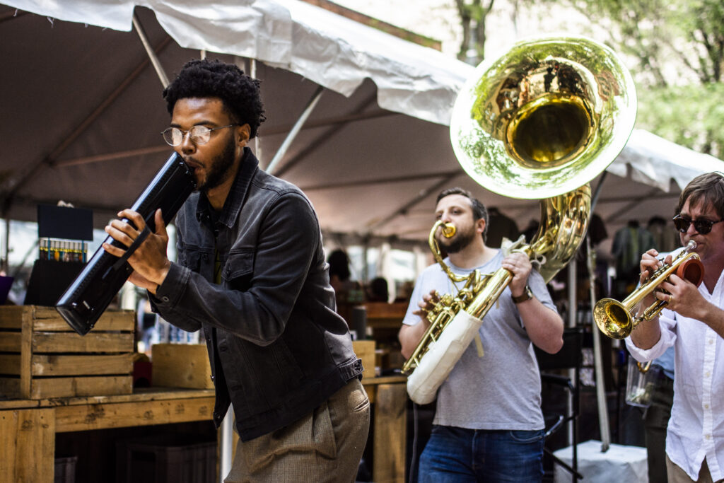 Hot Jazz, a brass band, performs at the Capitol Street Art Fair in Charleston, WV.